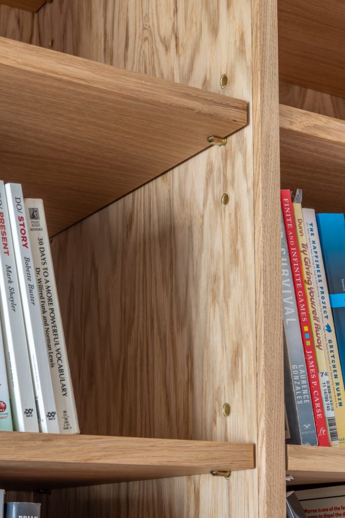 Picture of shelf stud detail on and oak veneered bookcase